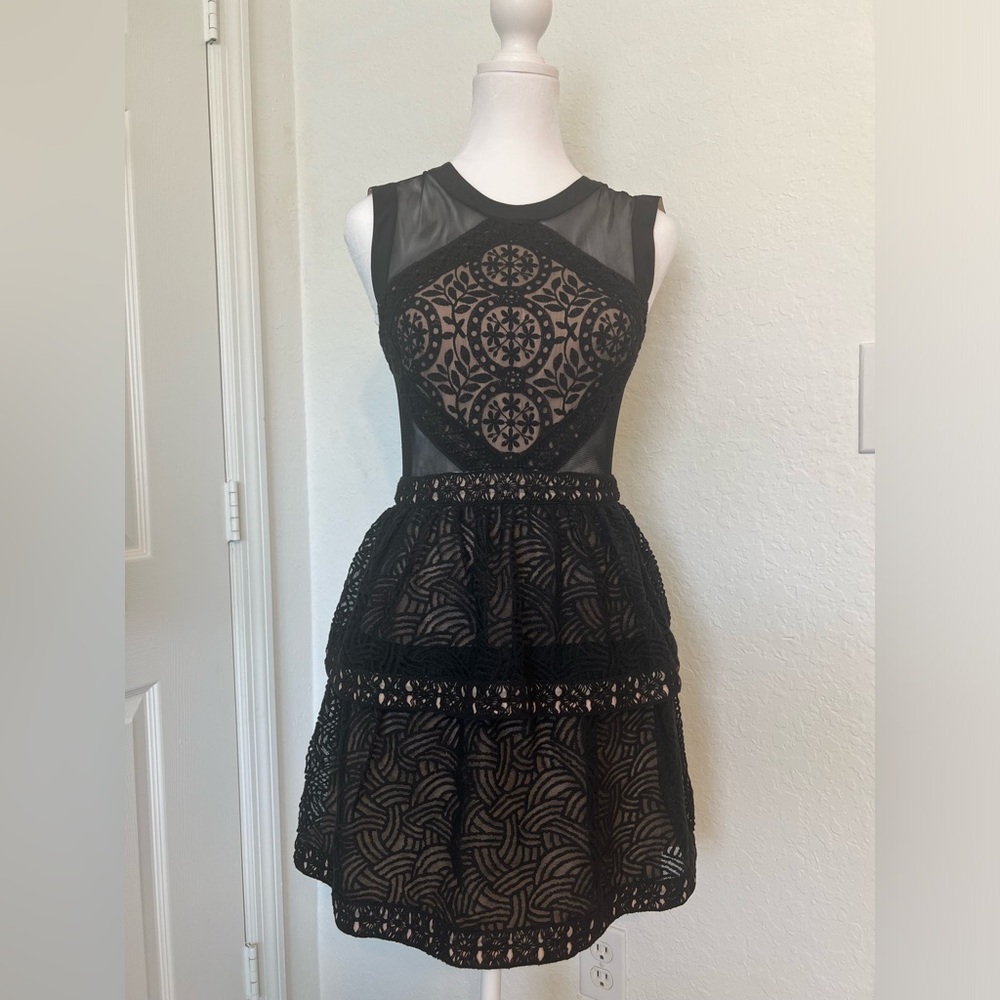 Stunning black BCBGMaxazria dress size 02 new without tags.